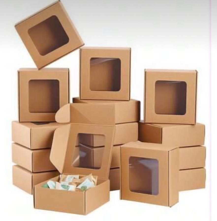 Kraft window boxes stacked, ready for retail packaging