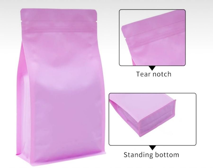 Pink stand-up pouch with tear notch and standing bottom detail